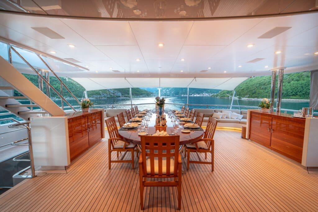 Luxury yacht with elegant dining area.